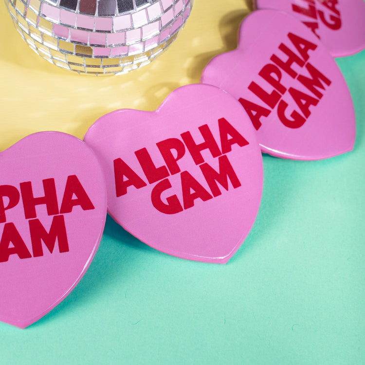 JCB Exclusive | Alpha Gam Heart Button